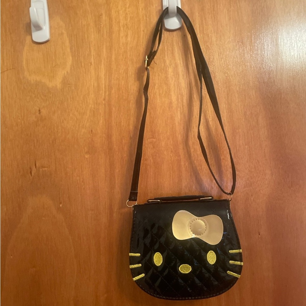 NWOT Hello Kitty Black and Gold Crossbody Bag